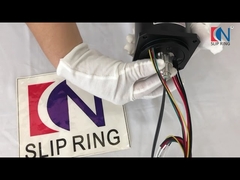 Integrated slip ring with fiber optic rotary joint